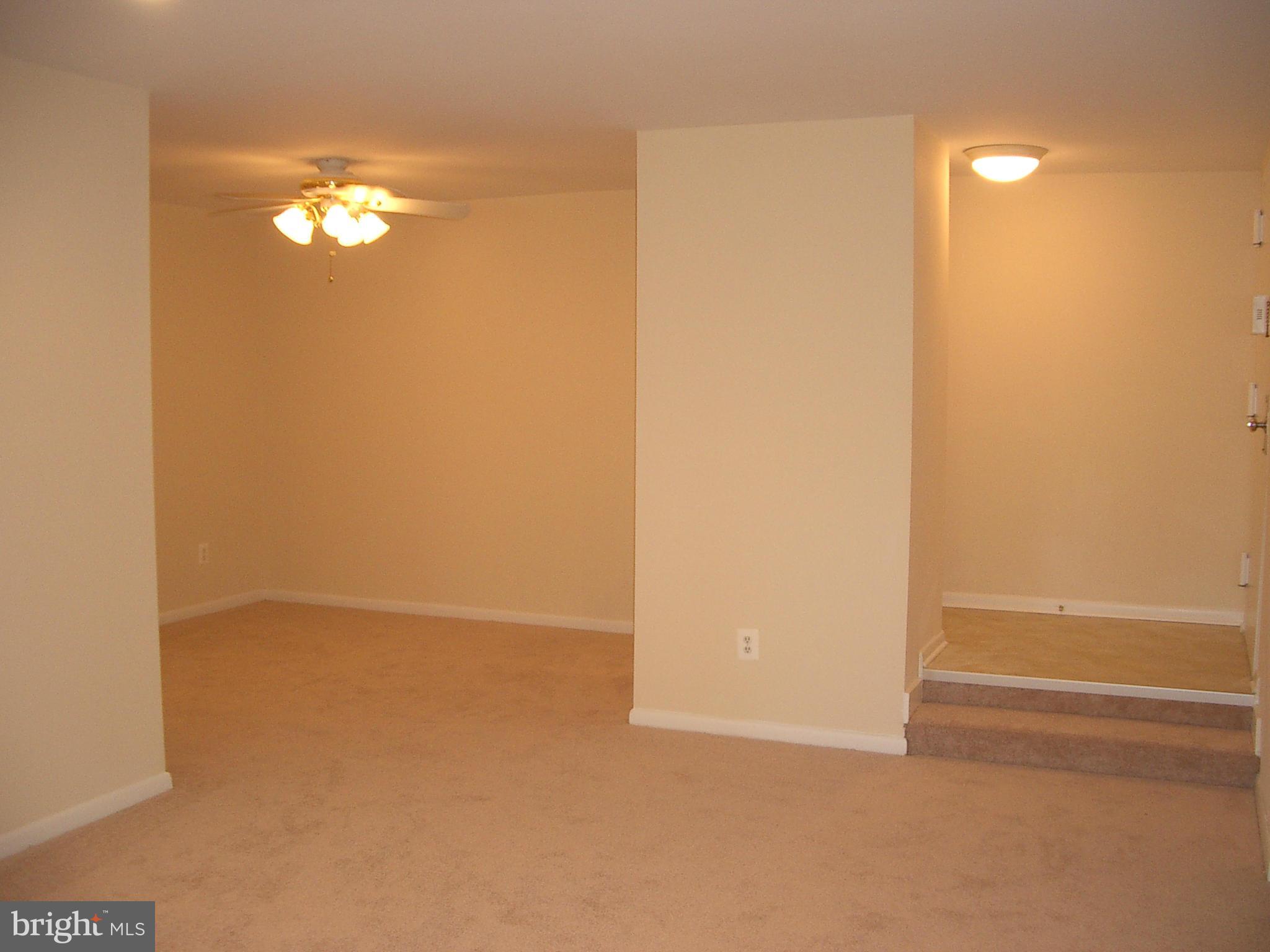 11200 Chestnut Grove Square, Unit 303 Reston, VA 20190 - Photo 6 of 30 a view of an empty room