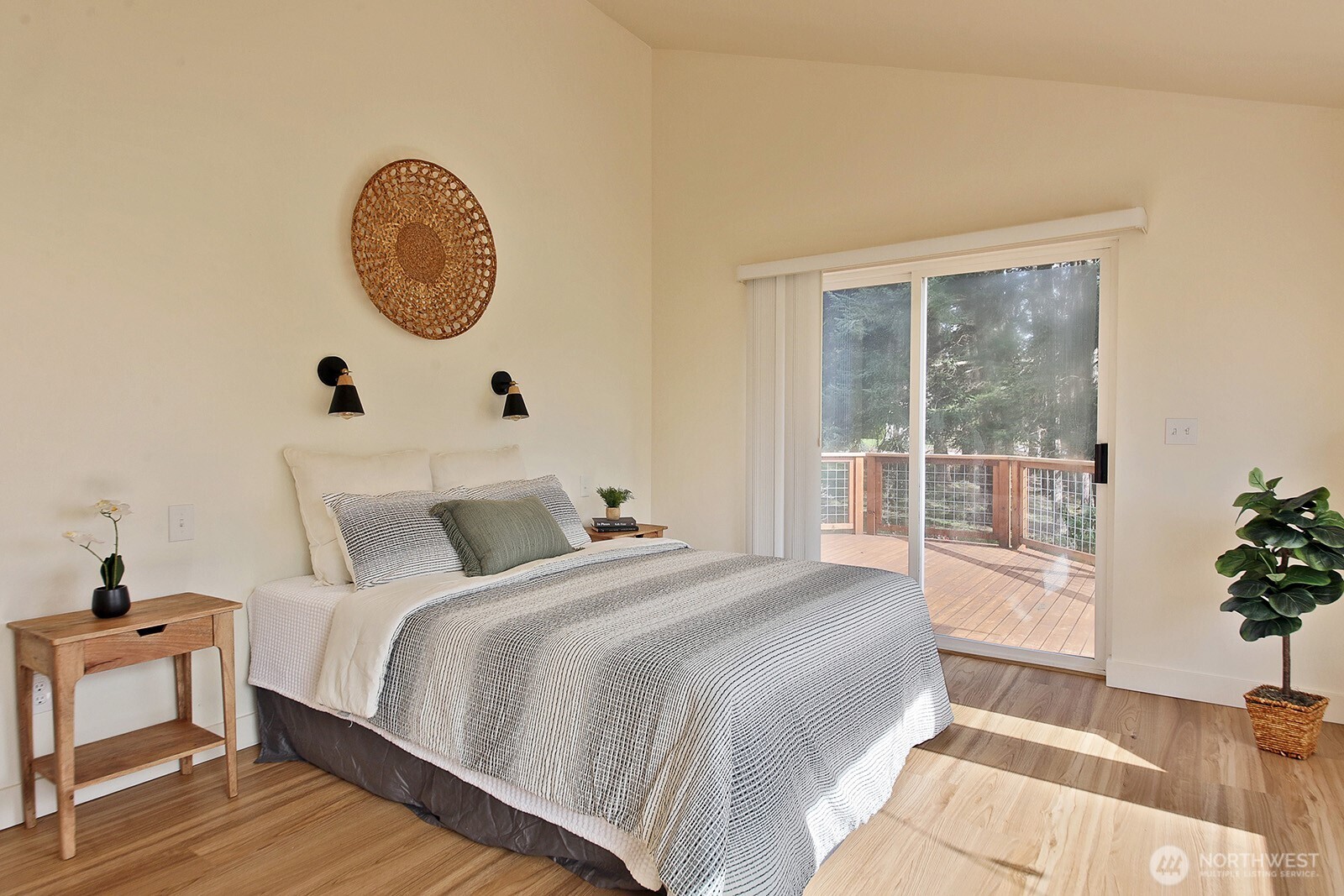 5663 Lenz Place Langley, WA 98260 - Photo 12 of 37 a bedroom with a bed and a window