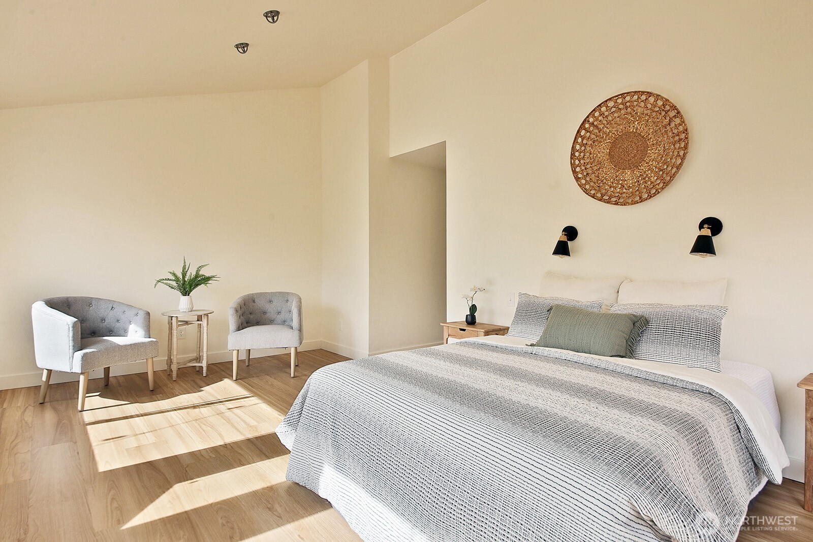 5663 Lenz Place Langley, WA 98260 - Photo 13 of 37 a bedroom with a bed and a chair