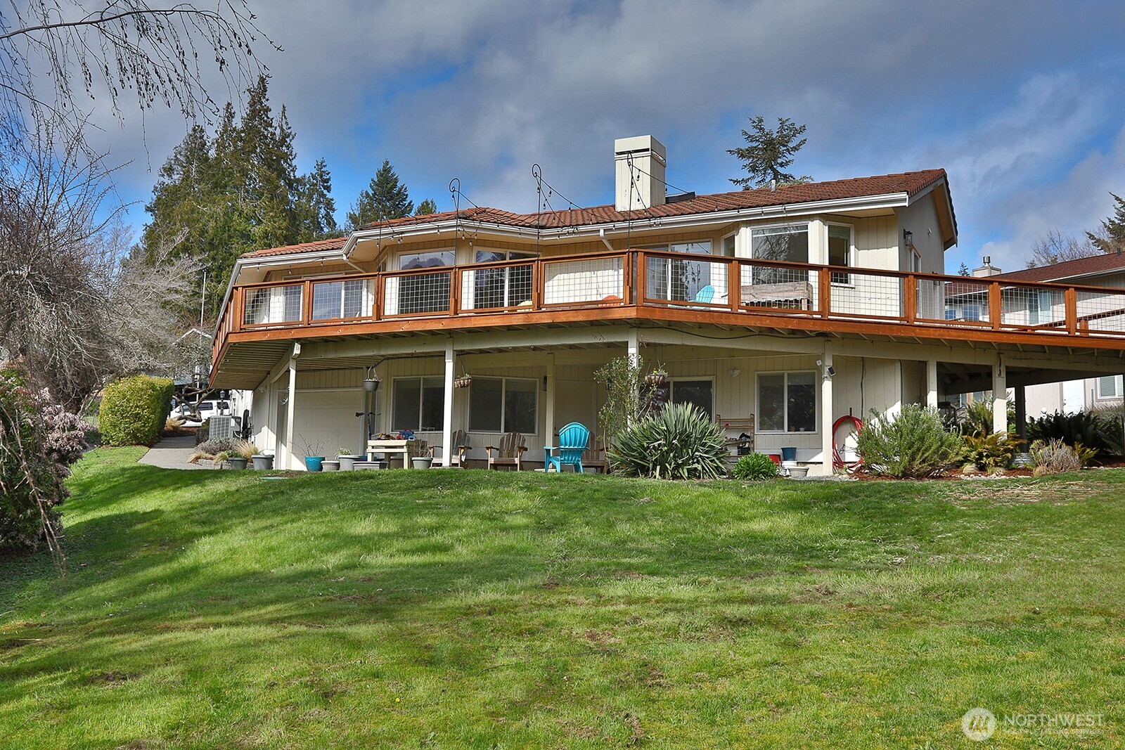 5663 Lenz Place Langley, WA 98260 - Photo 32 of 37 a front view of a house with a garden