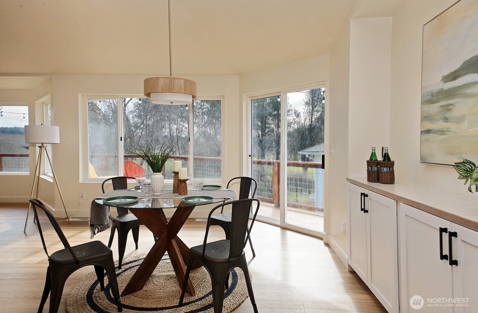5663 Lenz Place Langley, WA 98260 - Photo 7 of 37 a view of a dining room with furniture window and outside view