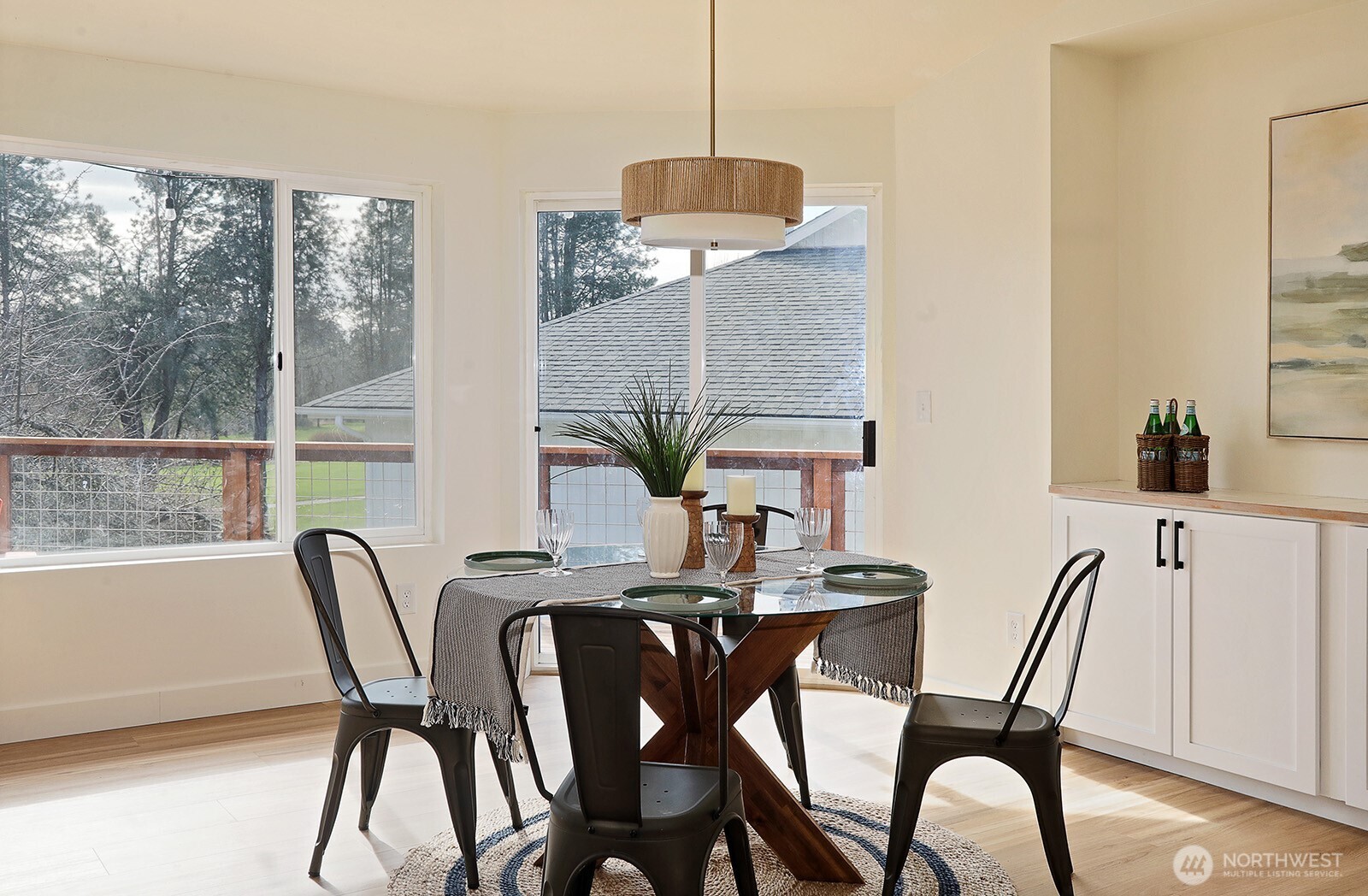 5663 Lenz Place Langley, WA 98260 - Photo 8 of 37 a view of a dining room with furniture window and outside view