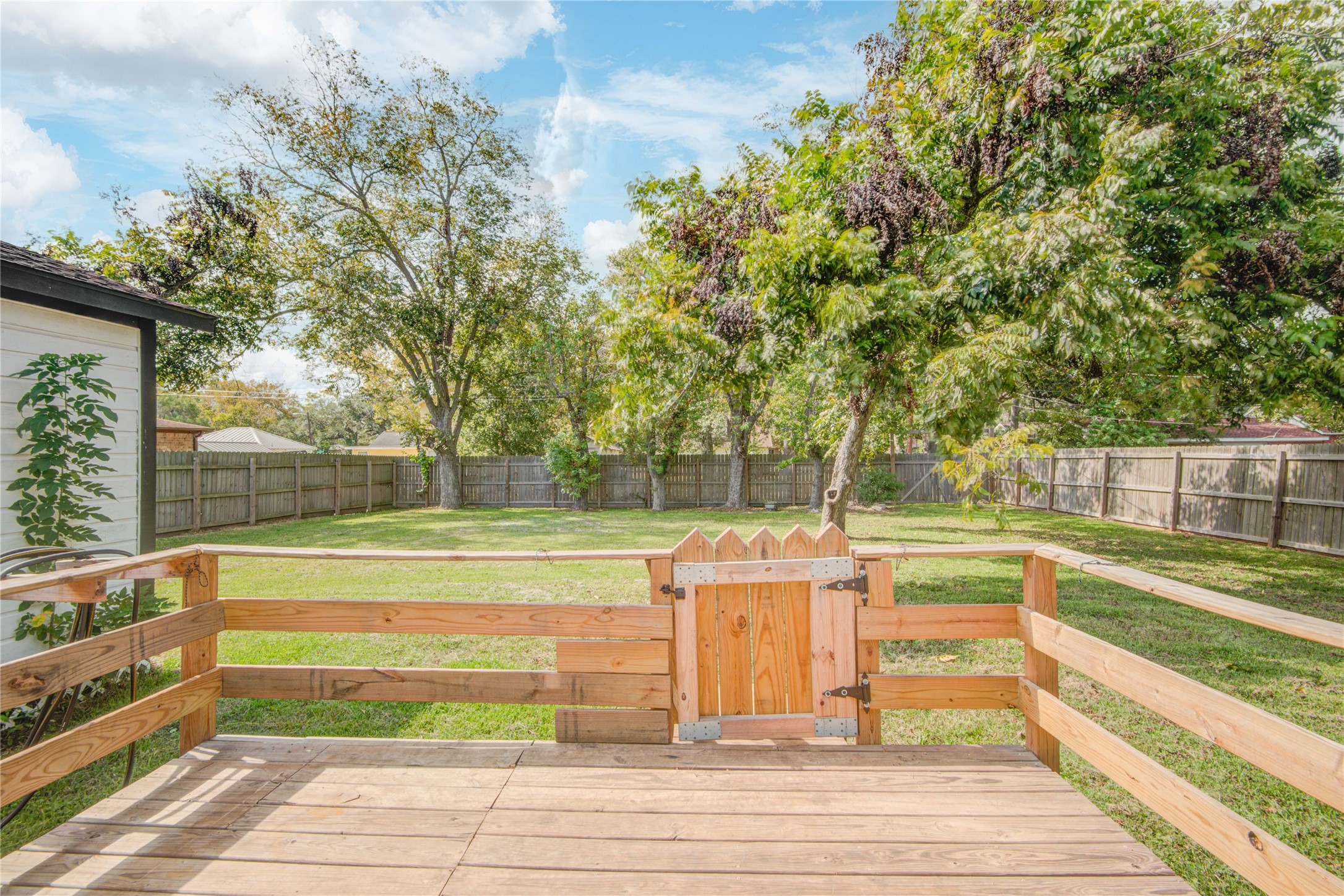 609 Hurst Place Angleton, TX 77515 - Photo 32 of 36 a view of a swimming pool with a patio