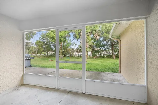 a bathroom with a shower and a sink