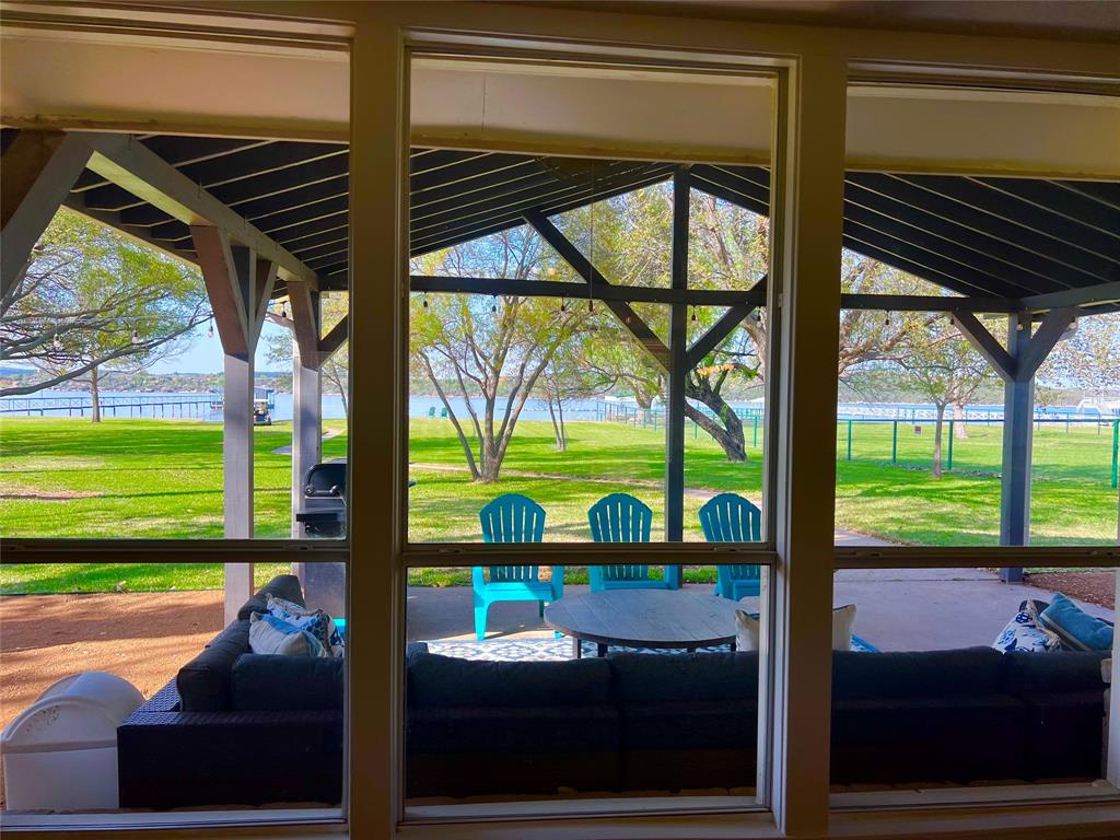 1957 Deer Trail Road Graford, TX 76449 - Photo 12 of 32 a view of swimming pool with outdoor seating