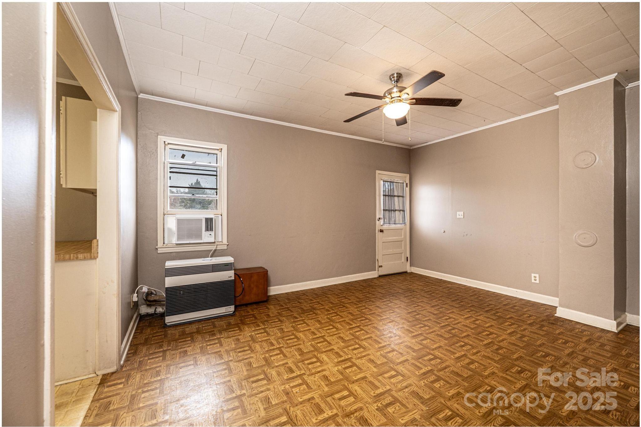 4823 Calico Road Lenoir, NC 28645 - Photo 22 of 31 a view of room with window and ceiling fan