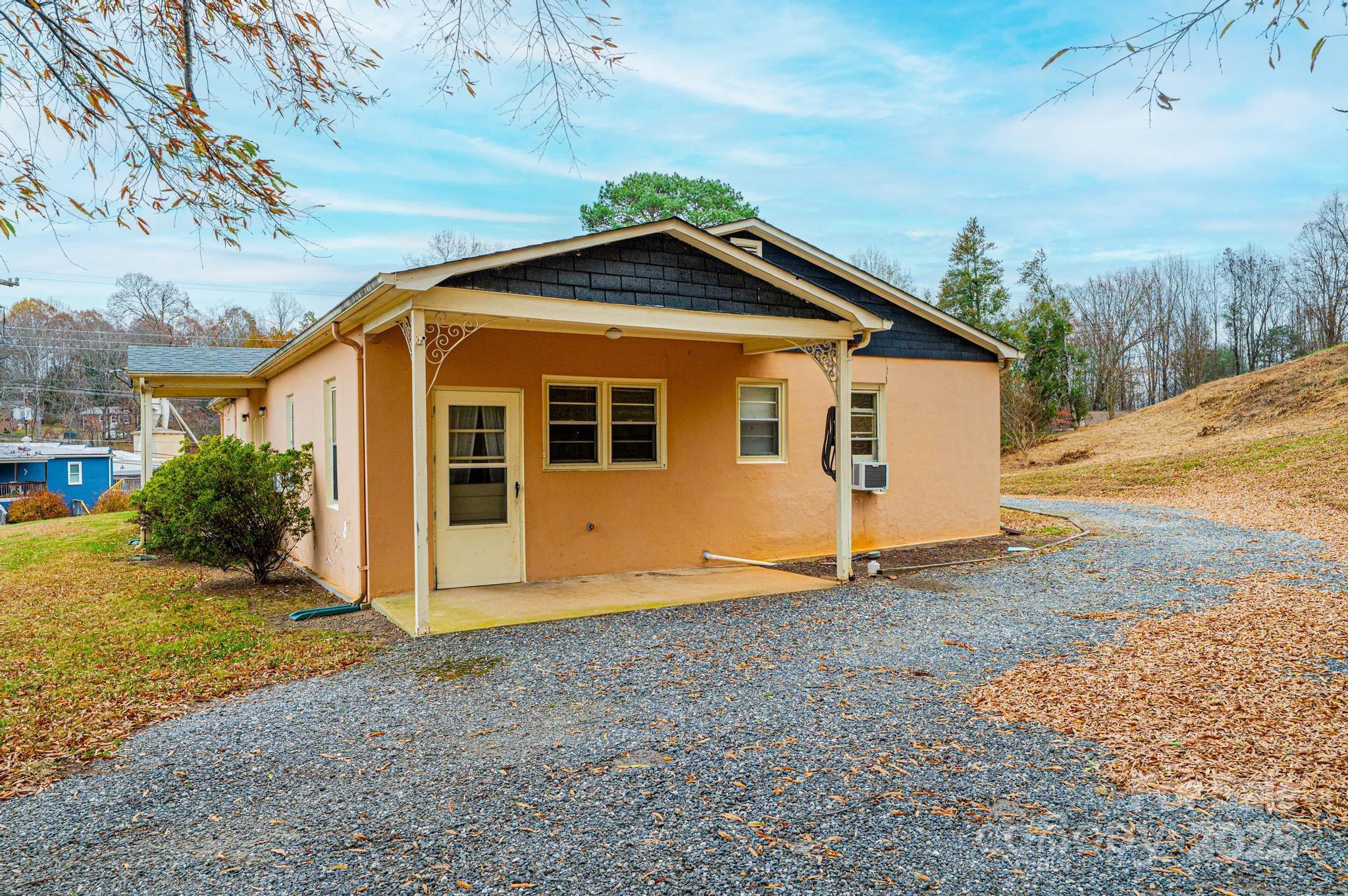 4823 Calico Road Lenoir, NC 28645 - Photo 10 of 31 a view of a house with a yard