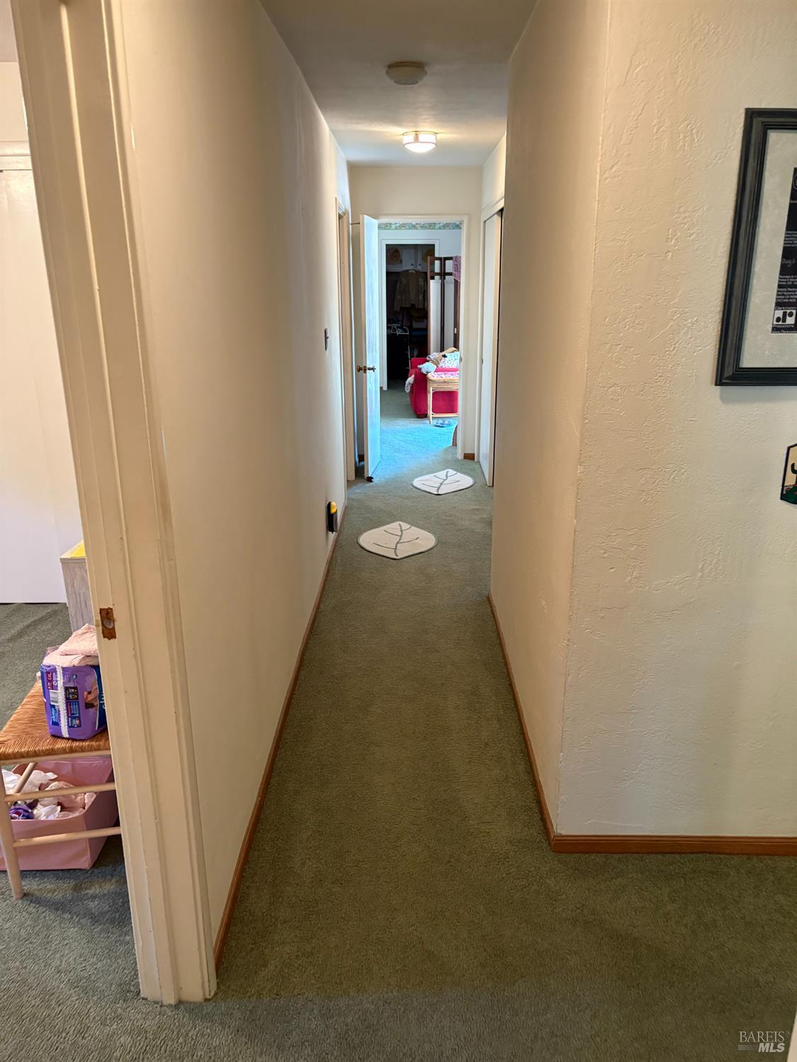 740 Linda Vista Way Rio Vista, CA 94571 - Photo 20 of 29 a view of a hallway to a livingroom with furniture