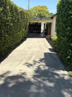 a view of a swimming pool with a backyard