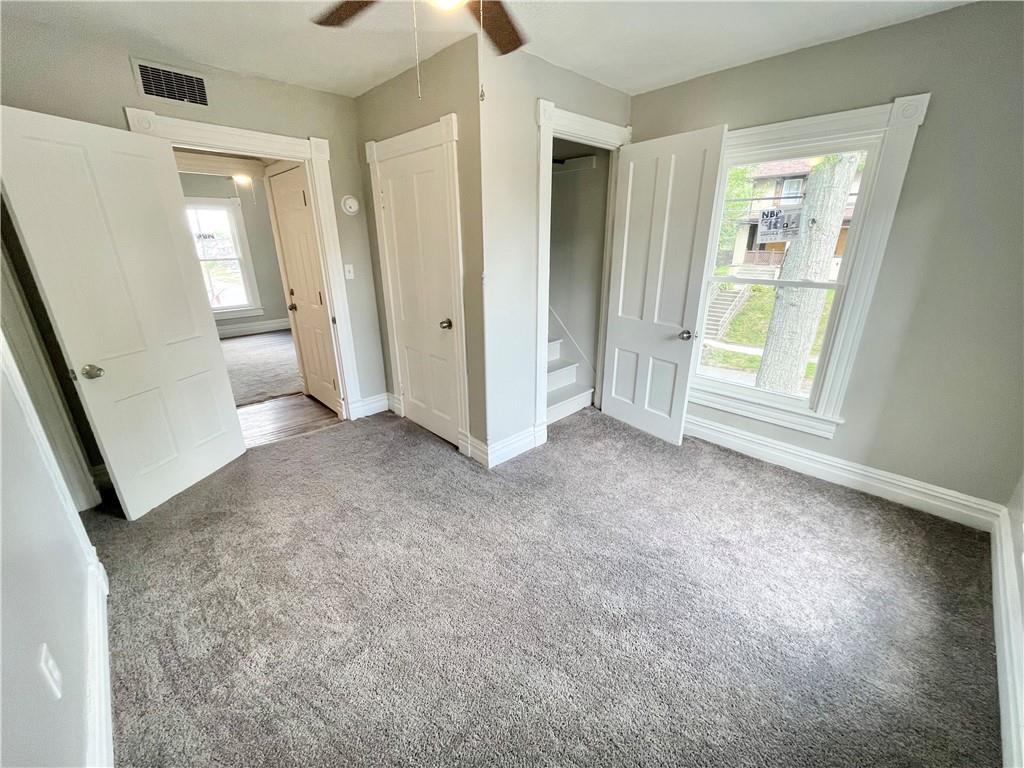 811 Carlisle Street, Unit 2 New Castle, PA 16101 - Photo 22 of 23 an empty room with windows and entrance