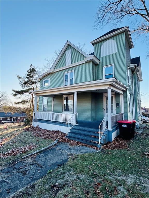 811 Carlisle Street, Unit 2 New Castle, PA 16101 - Photo 24 of 24 a front view of a house with garden