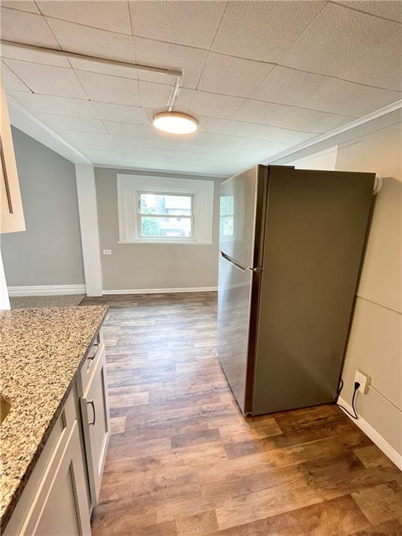 811 Carlisle Street, Unit 2 New Castle, PA 16101 - Photo 10 of 23 a view of a kitchen from the hallway