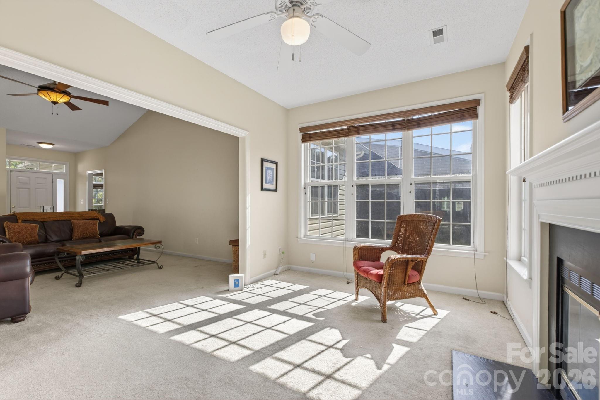 268 Farm Valley Road Fletcher, NC 28732 - Photo 11 of 30 a living room with furniture and a fireplace