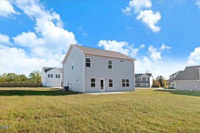 a front view of house with yard