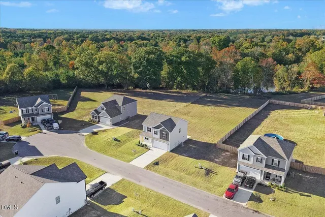 a view of a swimming pool with a lounge chair
