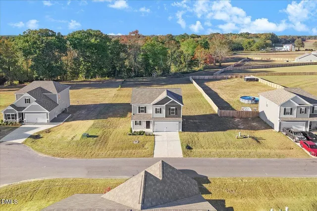 a view of a swimming pool with an outdoor seating