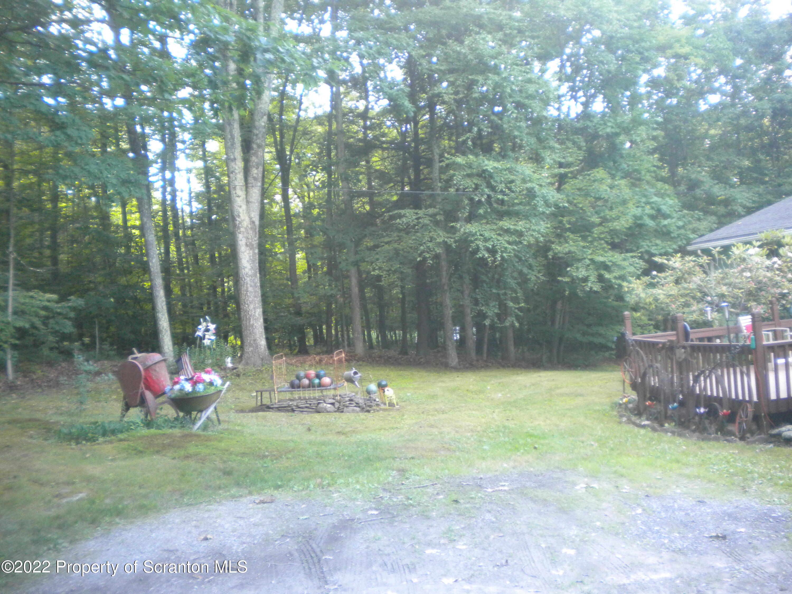 110 Marcy Road Tunkhannock, PA 18657 - Photo 8 of 28 a view of a backyard with garden