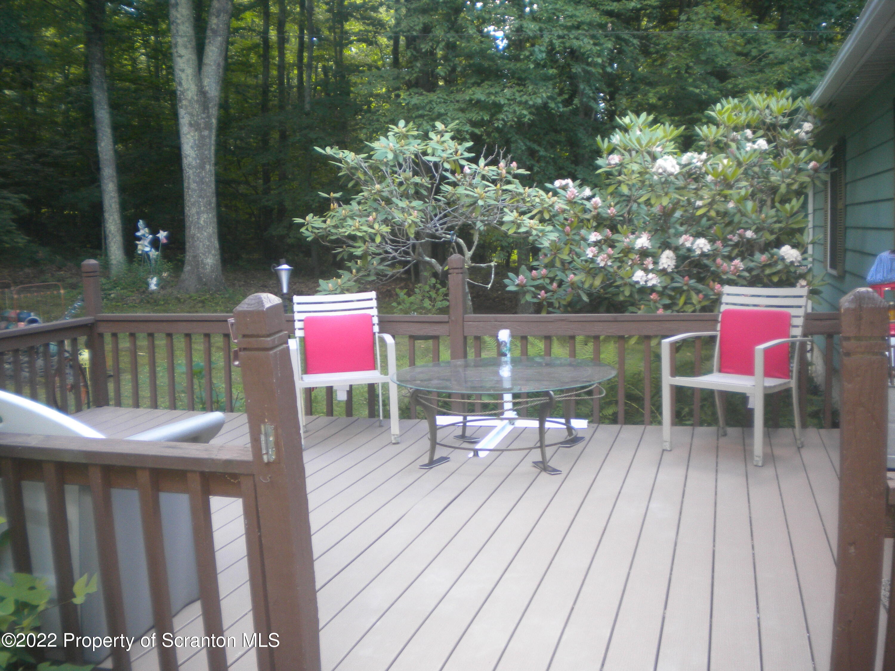 110 Marcy Road Tunkhannock, PA 18657 - Photo 10 of 28 a view of a chairs on the deck