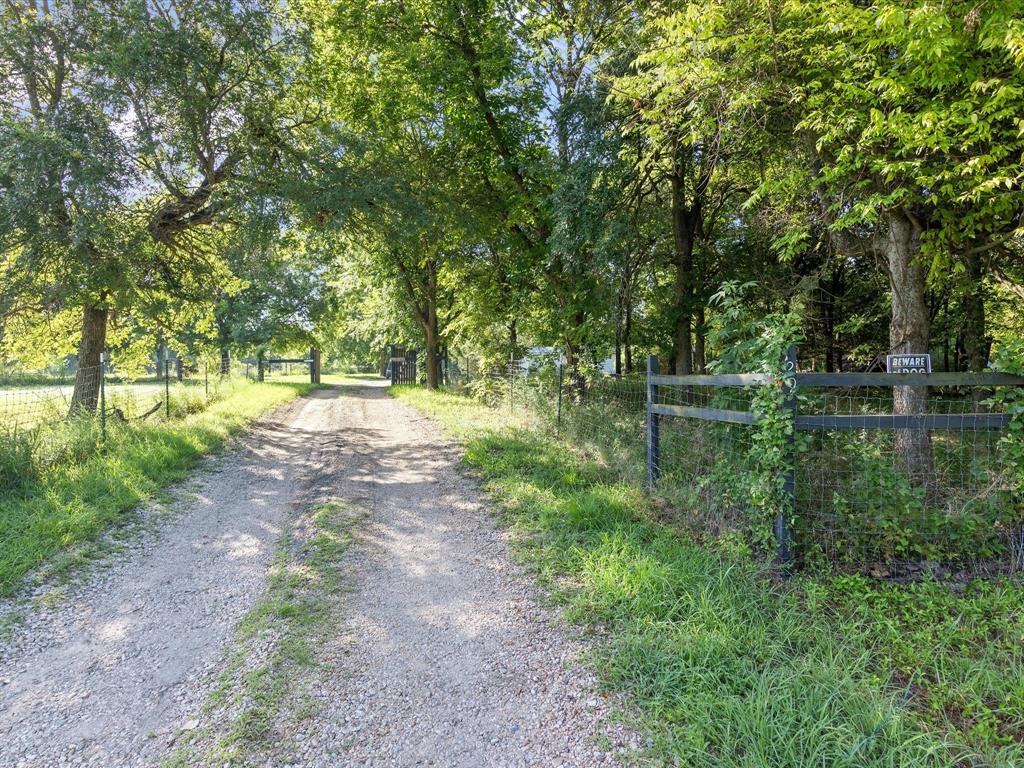 129 Hurst Circle Ferris, TX 75125 - Photo 1 of 1 a view of backyard with green space