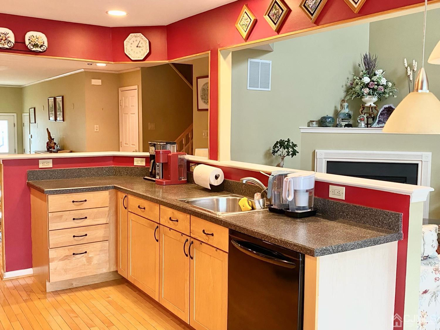47 Heron Pointe Court Evesham, NJ 08053 - Photo 14 of 44 a kitchen with granite countertop a sink and cabinets