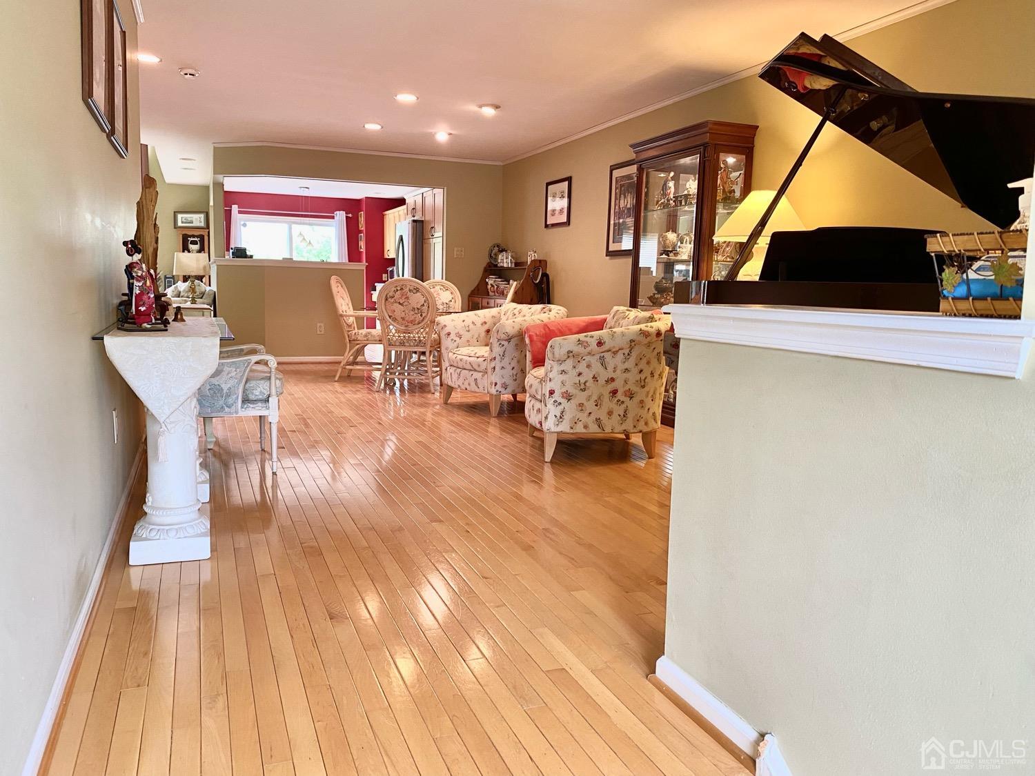 47 Heron Pointe Court Evesham, NJ 08053 - Photo 2 of 44 a living room with furniture and a wooden floor