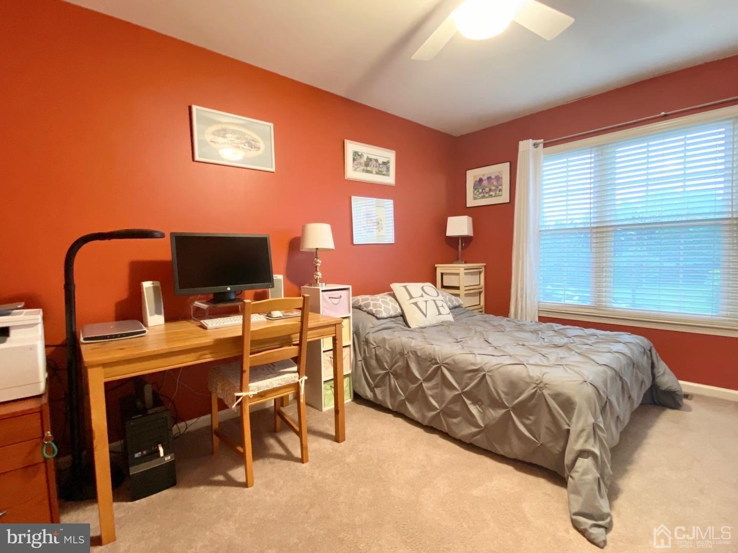 47 Heron Pointe Court Evesham, NJ 08053 - Photo 29 of 44 a bedroom with a bed and a flat screen tv