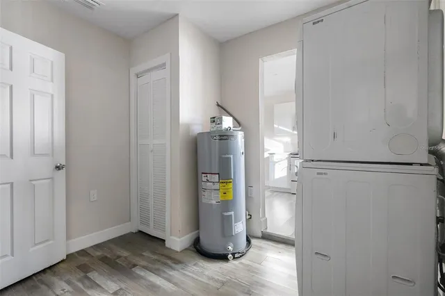 a view of an entryway with wooden floor