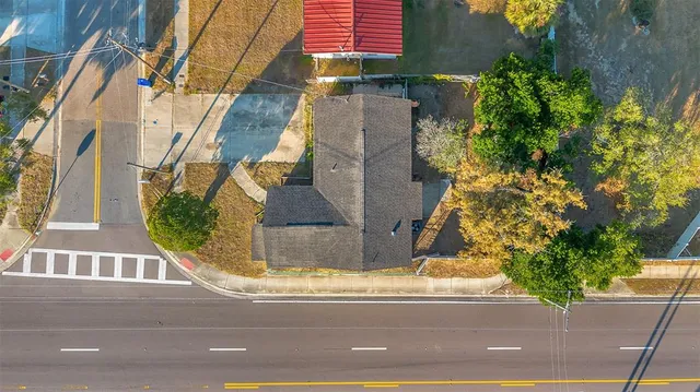 a view of a house with a street