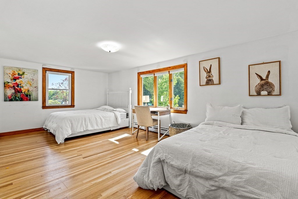 11 Main Street Winchester, MA 01890 - Photo 16 of 41 a bedroom with double bed and a window