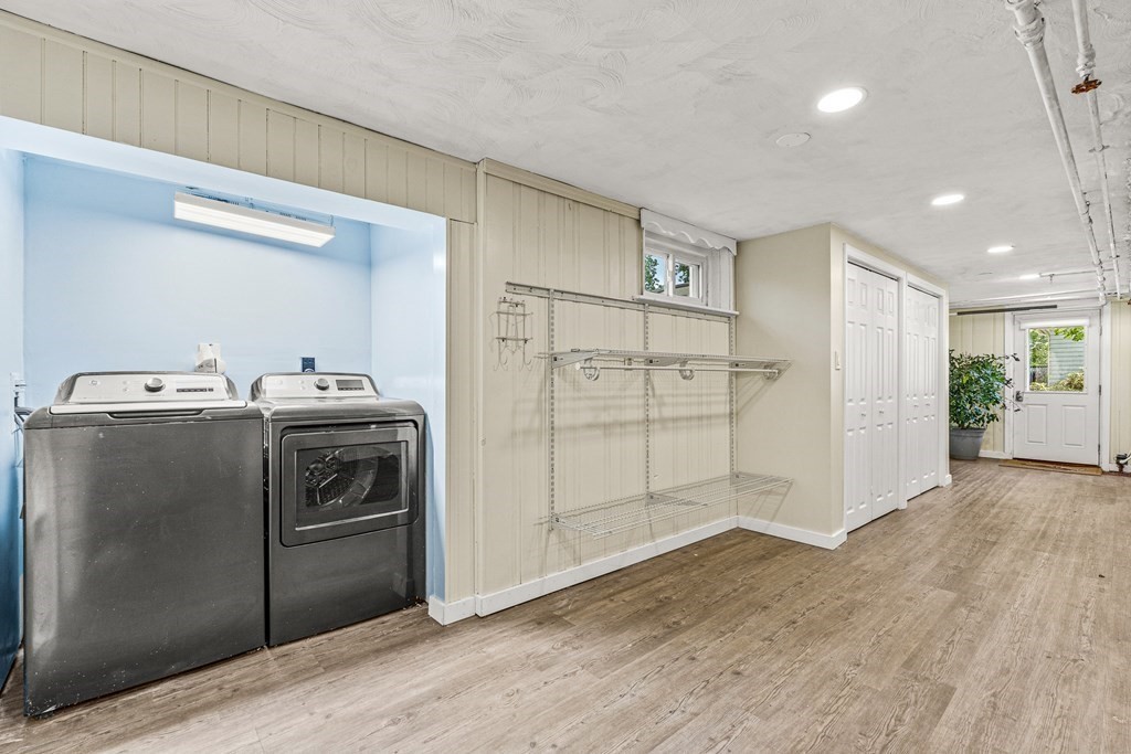 11 Main Street Winchester, MA 01890 - Photo 29 of 41 a kitchen with stainless steel appliances a refrigerator and a stove top oven