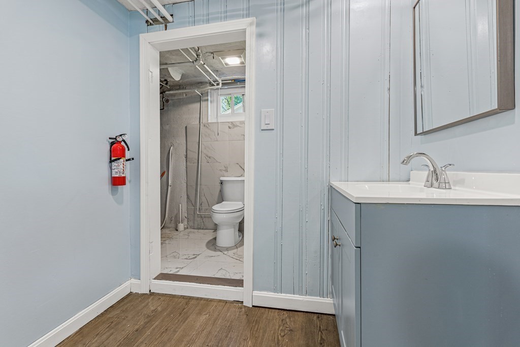 11 Main Street Winchester, MA 01890 - Photo 30 of 41 a bathroom with a sink and a shower