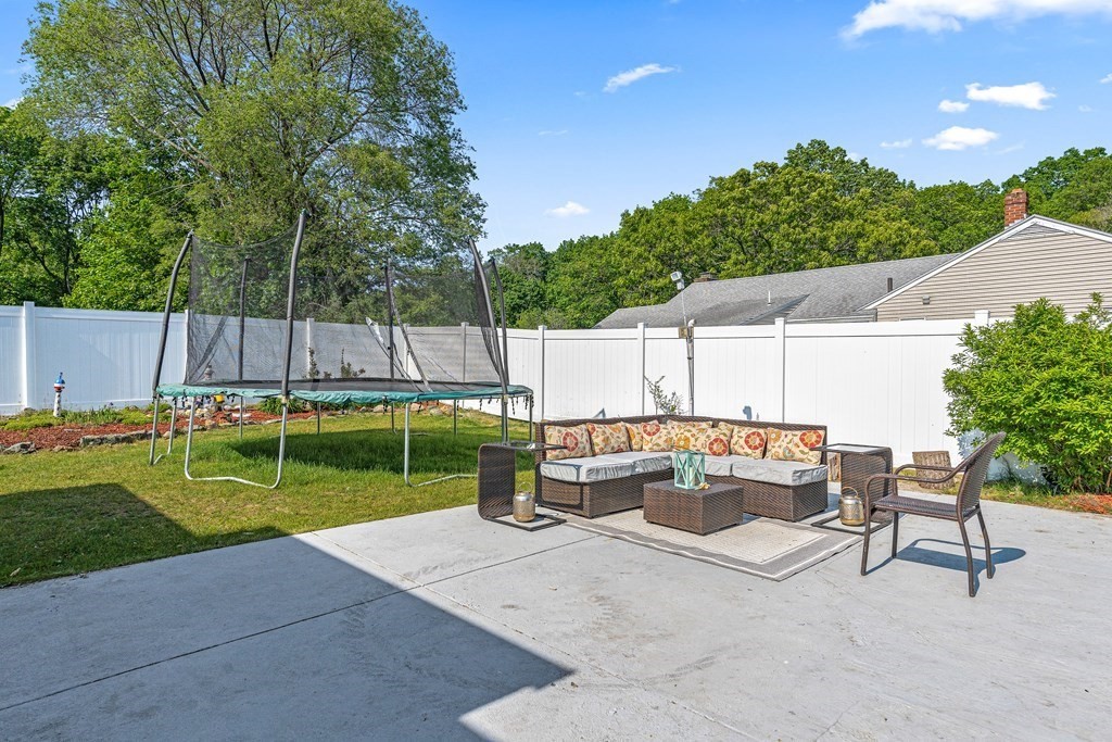 11 Main Street Winchester, MA 01890 - Photo 35 of 41 a view of backyard with swimming pool and outdoor seating