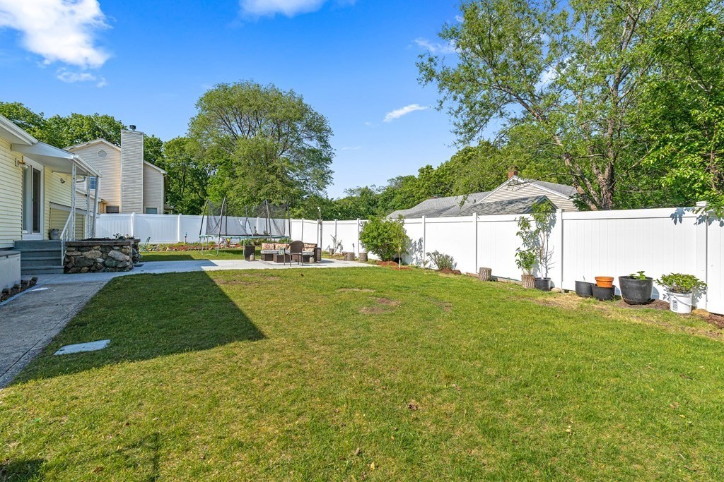 11 Main Street Winchester, MA 01890 - Photo 39 of 41 a view of yard with swimming pool and green space