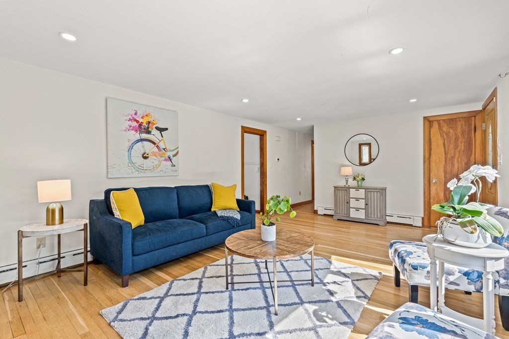 11 Main Street Winchester, MA 01890 - Photo 6 of 41 a living room with furniture and wooden floor