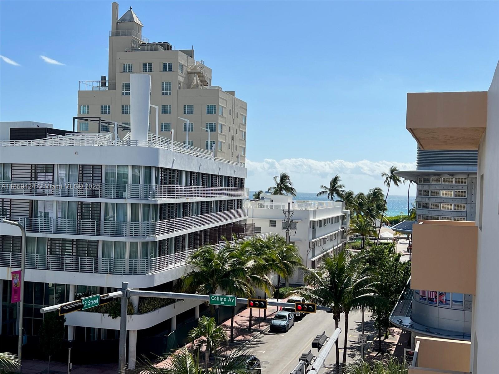 1150 Collins Avenue, Unit 503 Miami Beach, FL 33139 - Photo 12 of 12 a view of building with yard and staircase