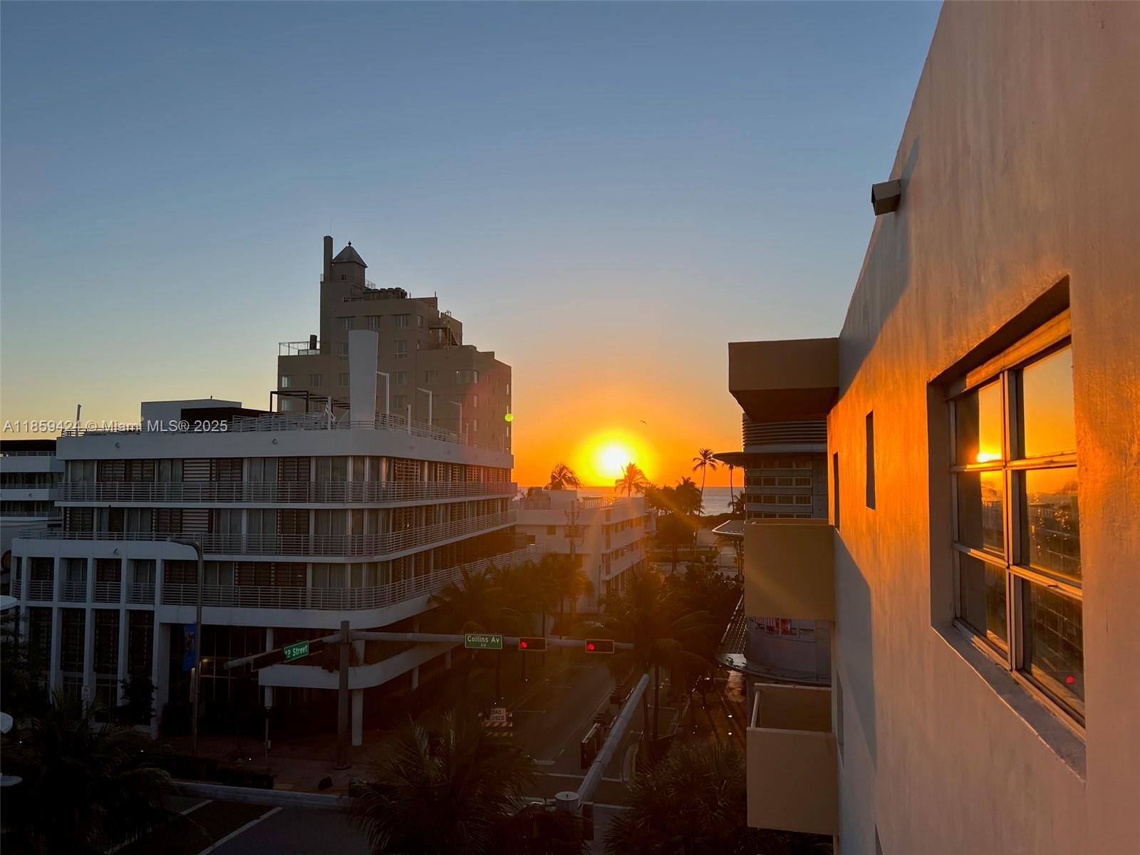 1150 Collins Avenue, Unit 503 Miami Beach, FL 33139 - Photo 10 of 12 a view of a buildings from a balcony