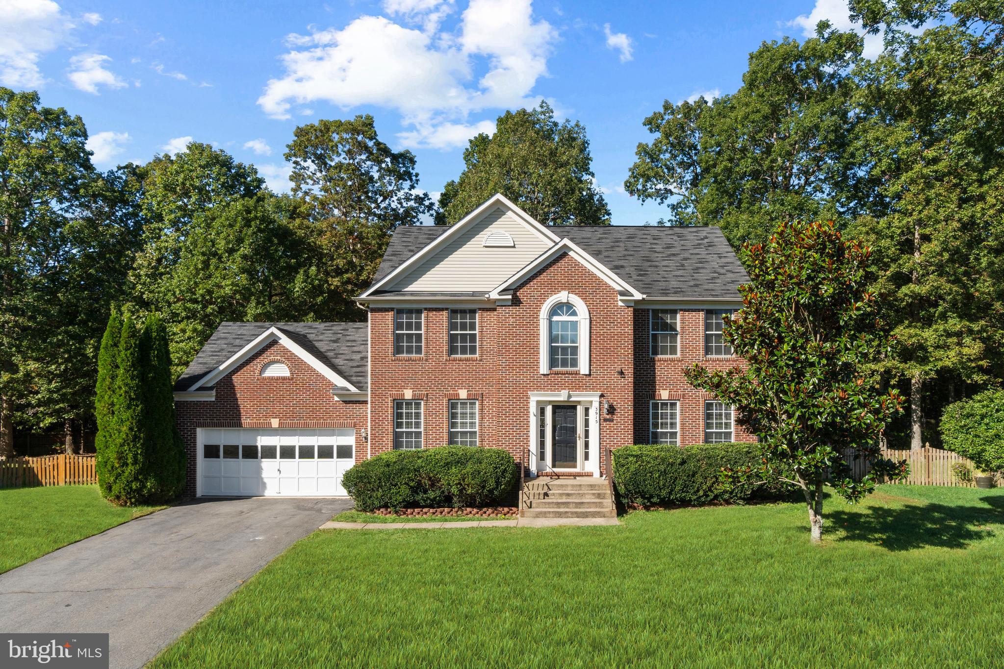 Brick-front colonial w/ over 3,300 finished sq. ft
