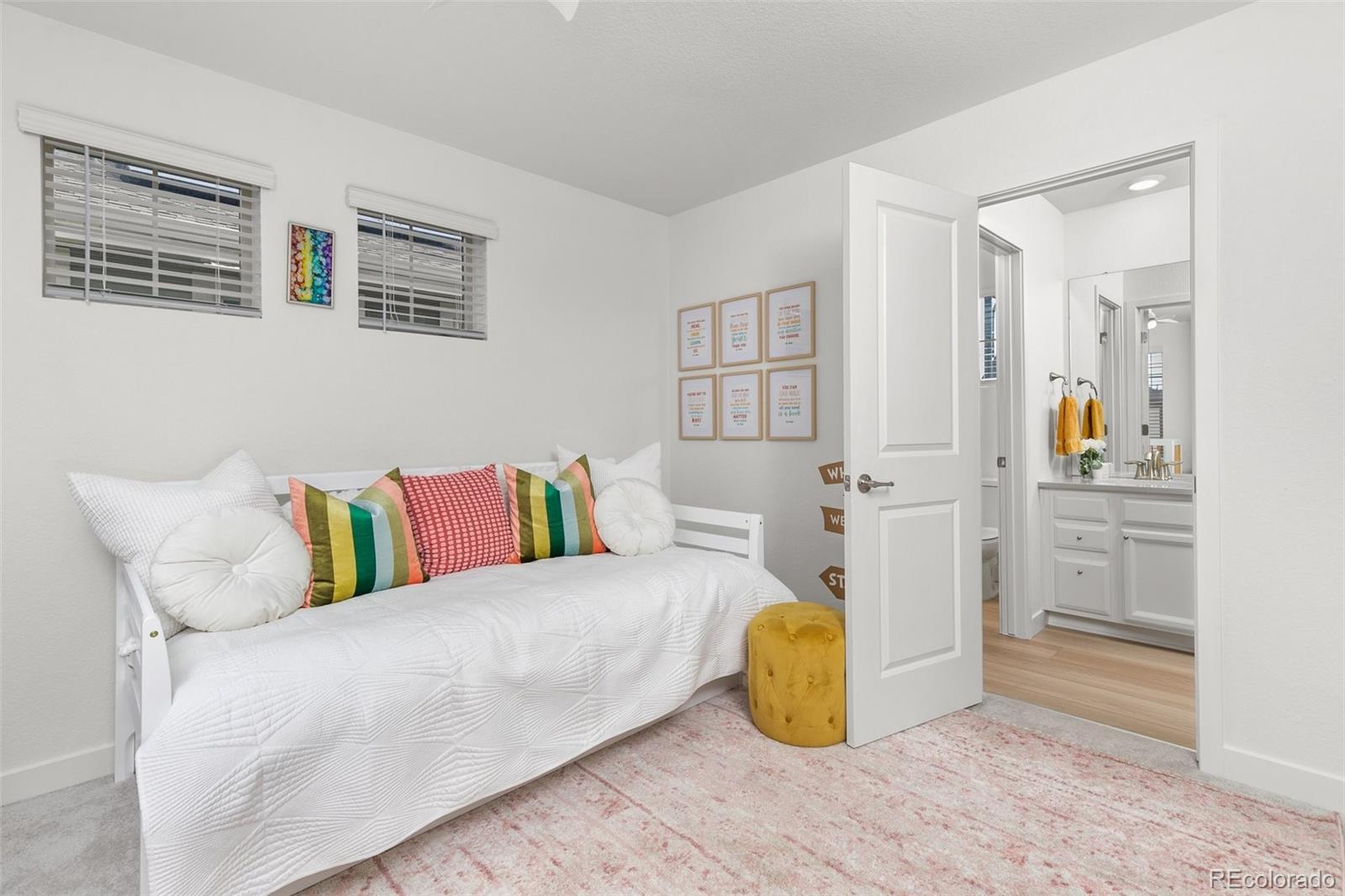 6267 North Florence Way Denver, CO 80238 - Photo 30 of 41 a living room with a couch