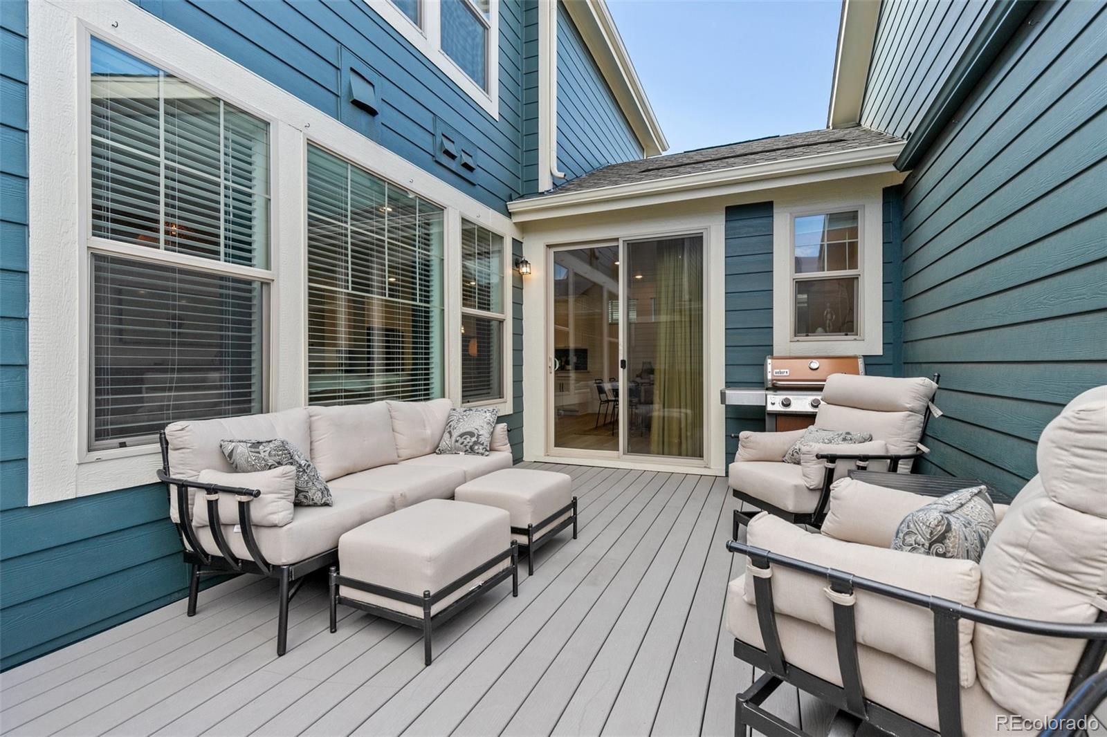 6267 North Florence Way Denver, CO 80238 - Photo 35 of 41 a outdoor space with patio the couches and a potted plant with outer view