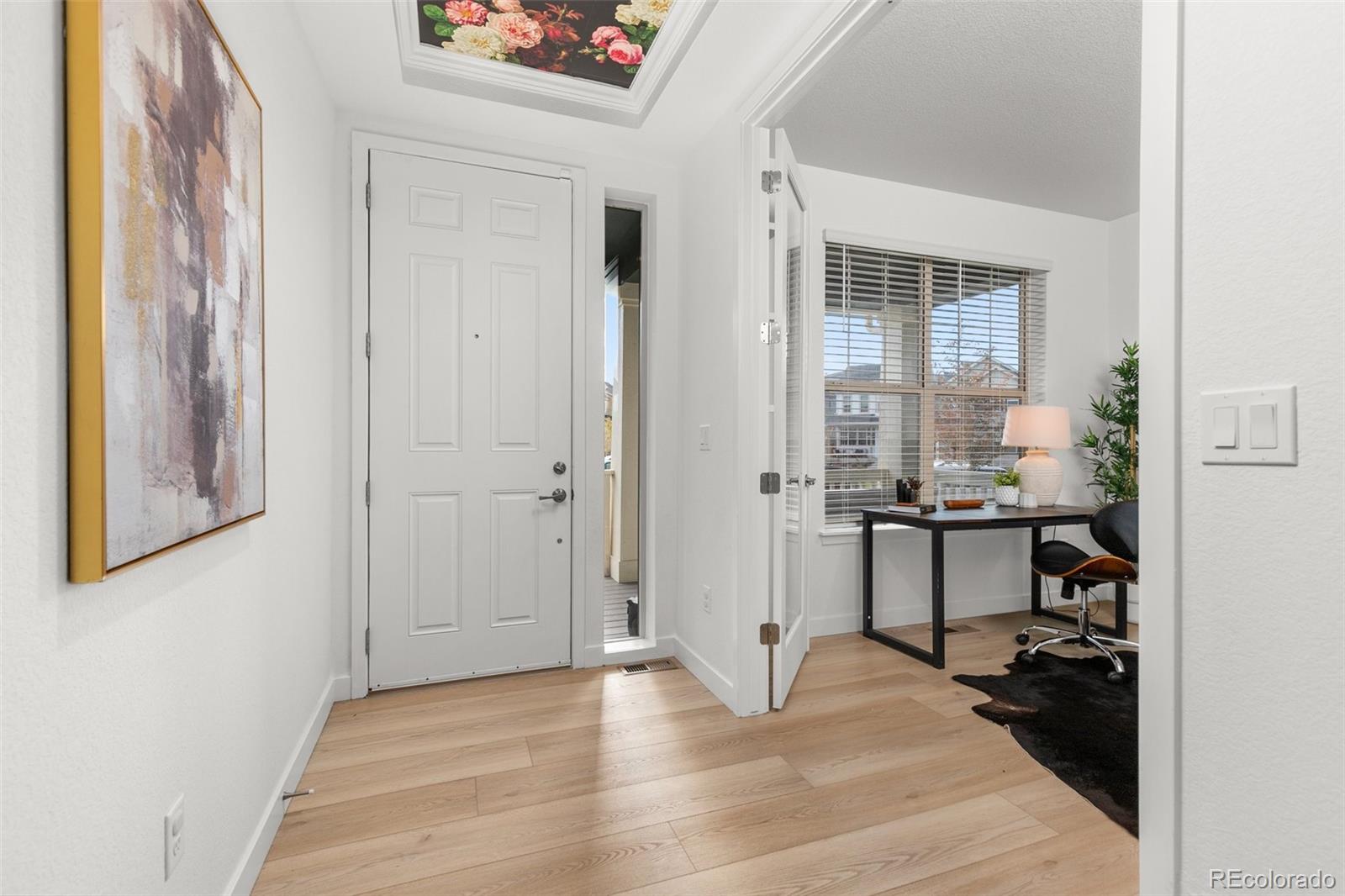 6267 North Florence Way Denver, CO 80238 - Photo 5 of 41 a view of a kitchen and dining room
