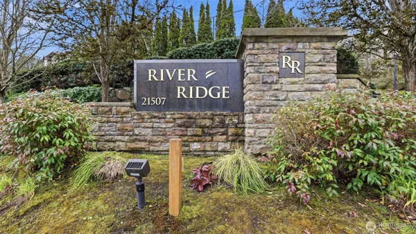 a signage on a brick wall