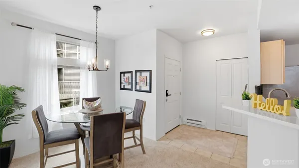 a view of a dining room with furniture