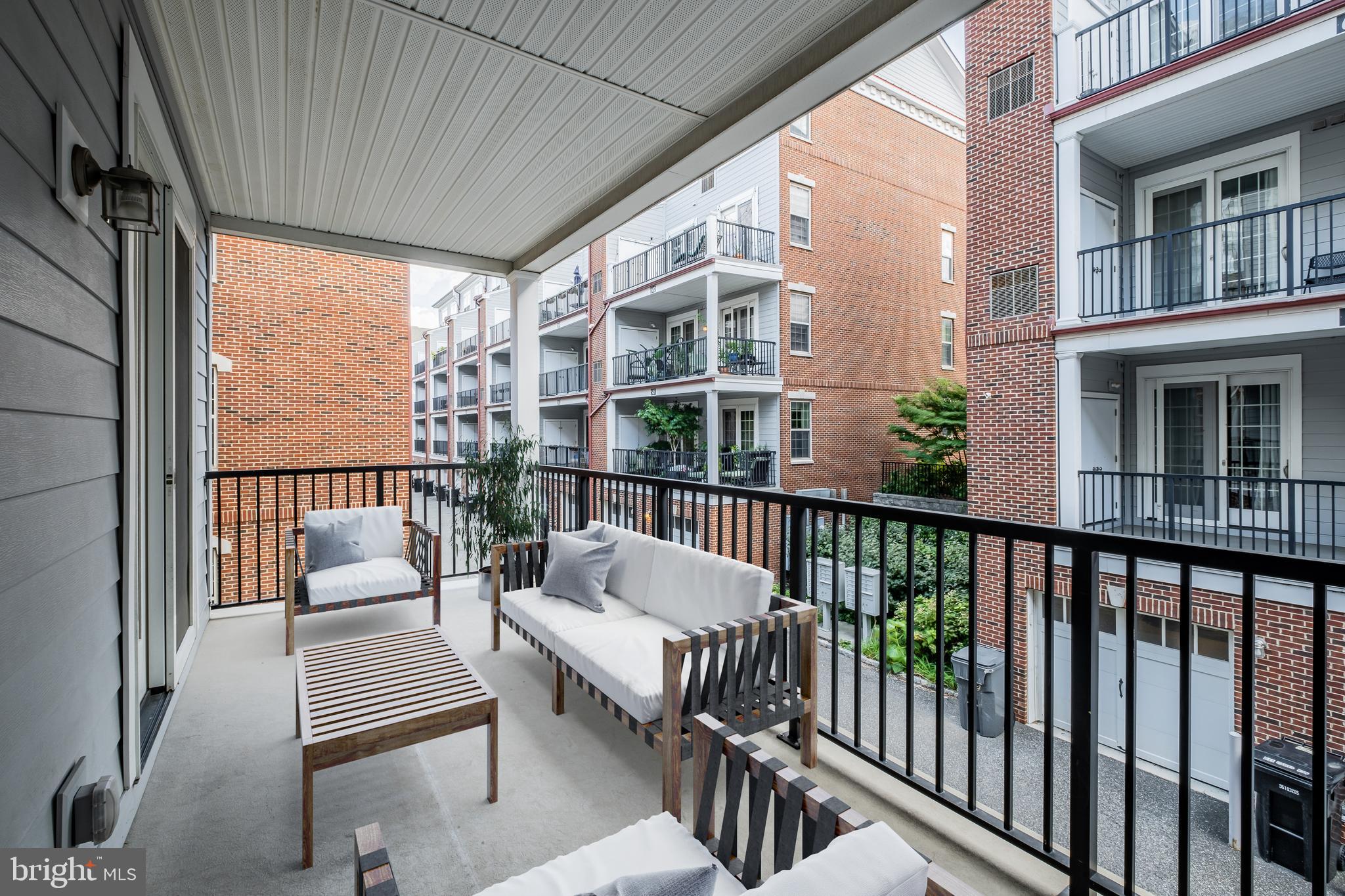 201 Commodore Court Philadelphia, PA 19146 - Photo 30 of 61 a view of a balcony with couch