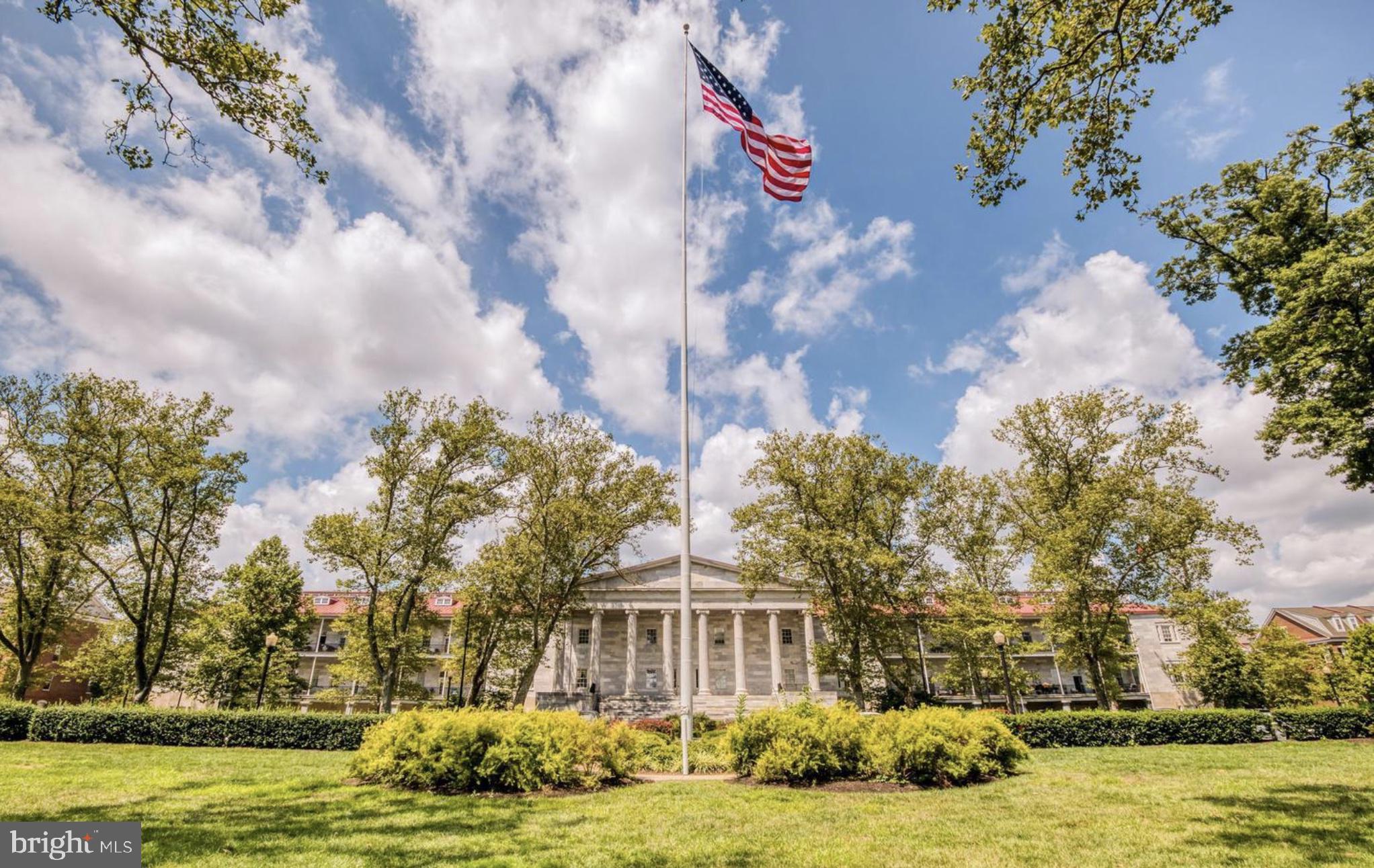 201 Commodore Court Philadelphia, PA 19146 - Photo 51 of 61 a front view of house with yard and trees around