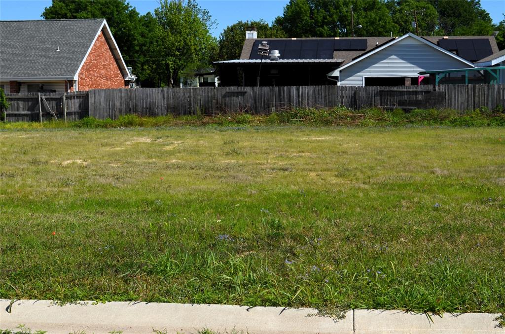 304 Preston Road Mabank, TX 75147 - Photo 6 of 6 a view of house with garden and deck