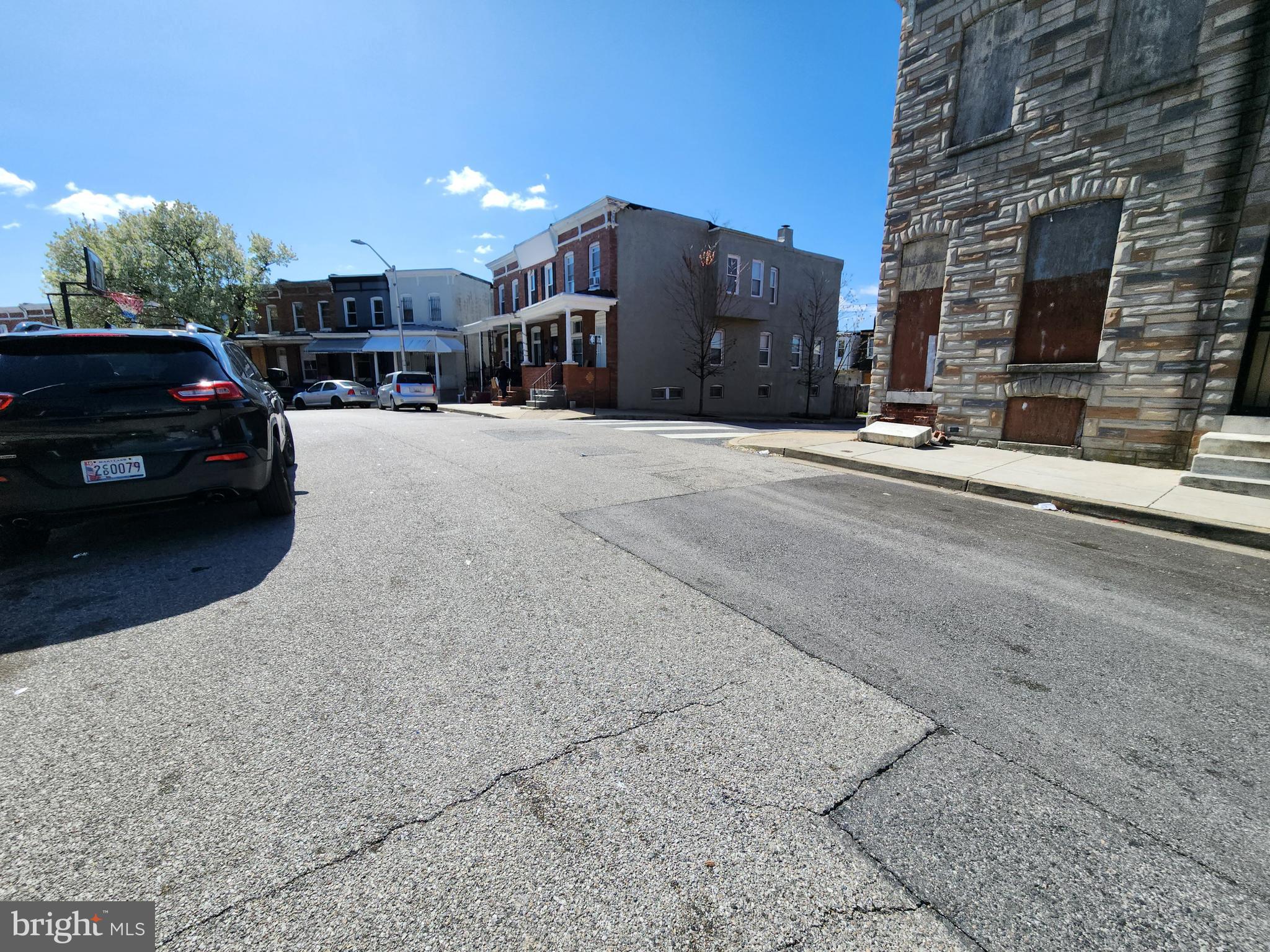 1508 Cliftview Avenue Baltimore, MD 21213 - Photo 18 of 18 a view of street with parked cars