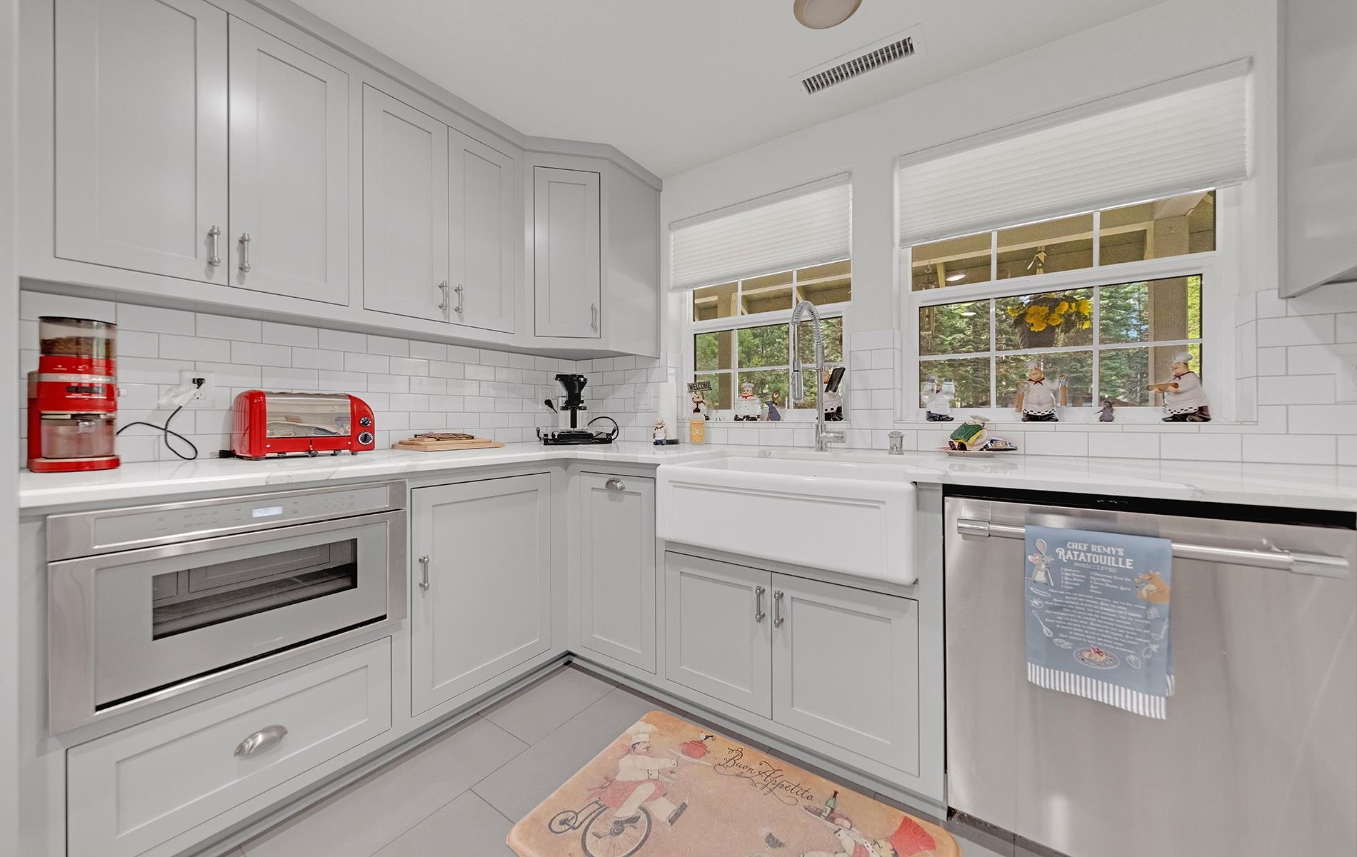 650 Wagon Road Chester, CA 96020 - Photo 8 of 36 a kitchen with white cabinets and white appliances