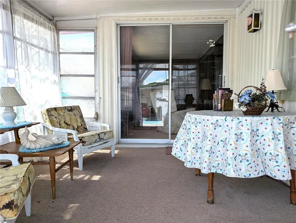 a bedroom with a bed and a view of bathroom