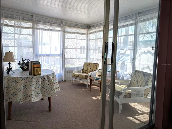 a bedroom with a bed and a closet