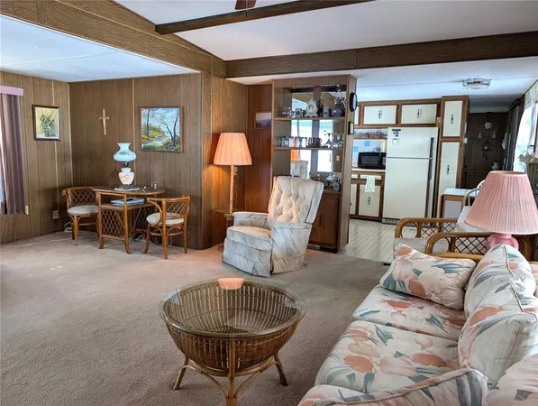 a bedroom with a bed and cabinets